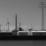 Wind turbine and industrial facility representing environmental credits