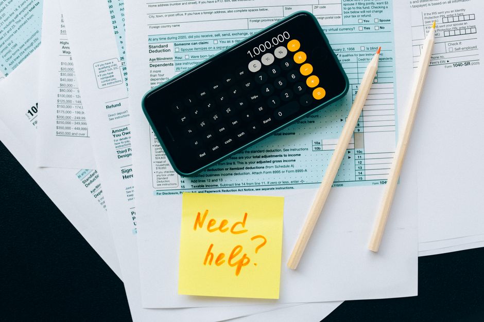 A close-up of tax forms and a calculator
