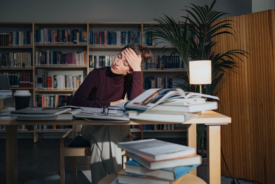 CPA study guides and a calculator on an office desk