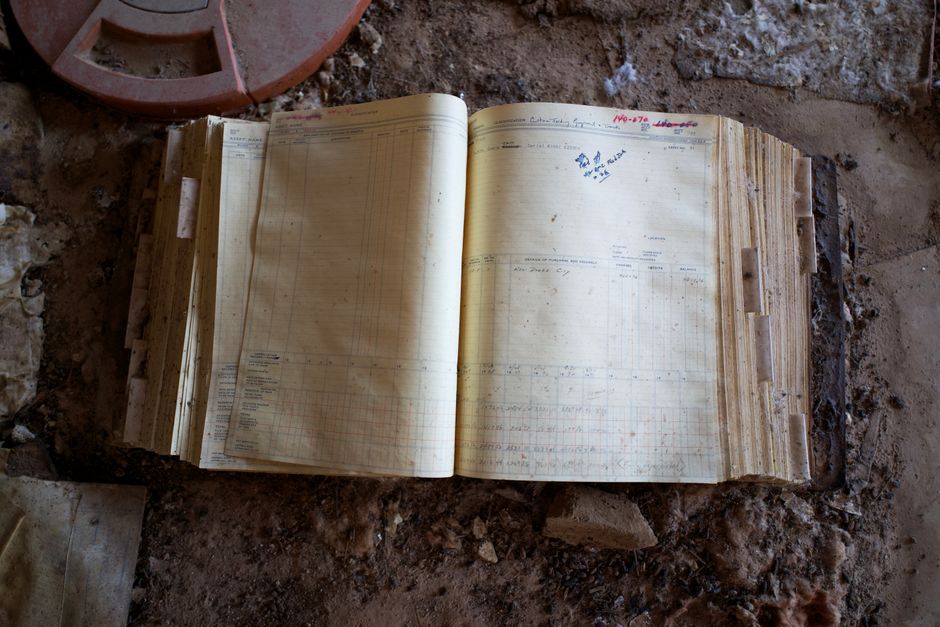 A vintage accounting journal book with numbers