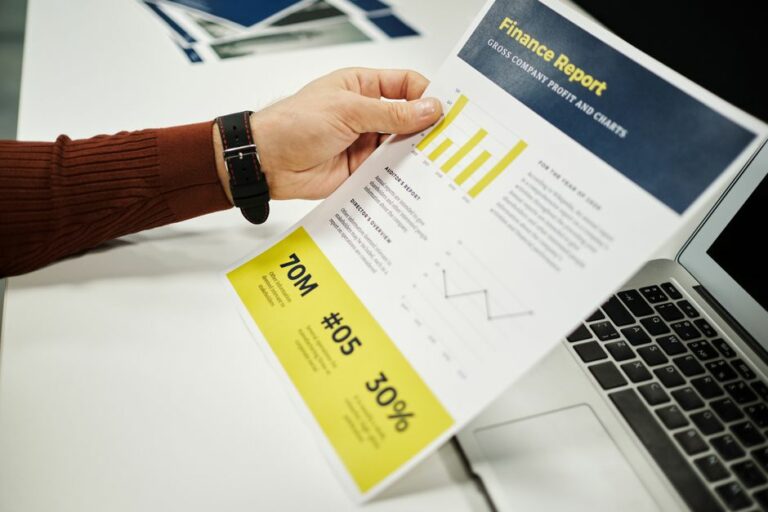A corporate professional reviewing environmental reports on a tablet