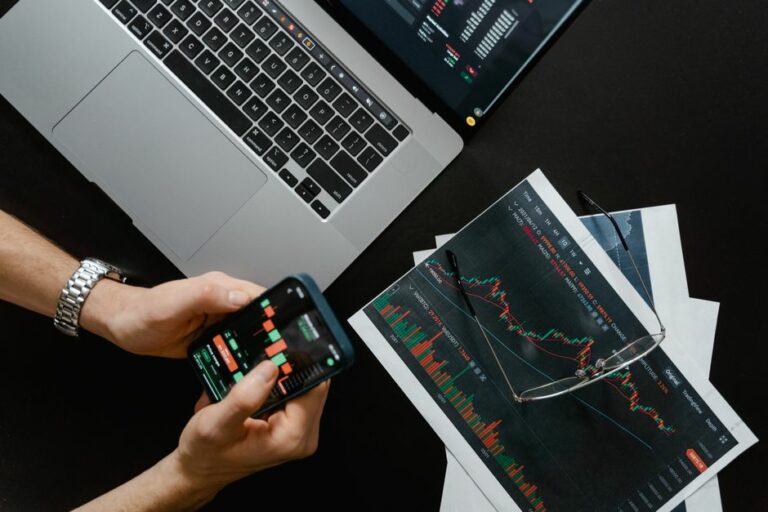 A beginner looking at a stock portfolio on a smartphone screen, displaying a simple and clean interface with charts.