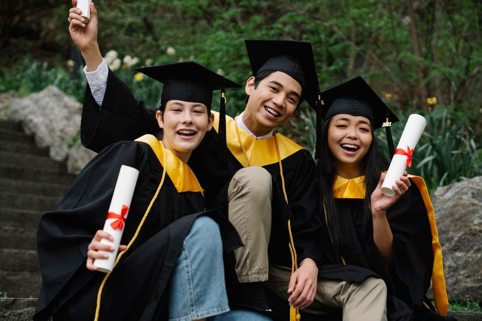 A graduate holding a degree certificate with a calculator and money, representing student loan repayment.