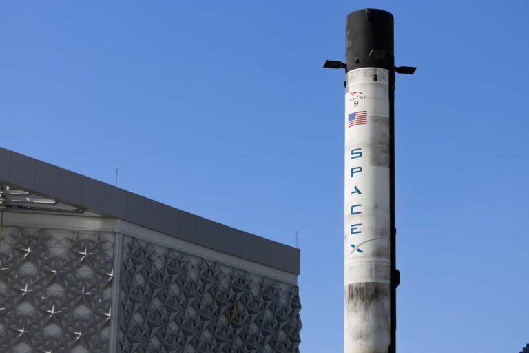 A SpaceX rocket launch ascending into space, representing SpaceX SPCX stock.