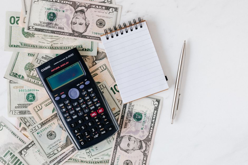 A bank check on a desk, highlighting the routing and account numbers.