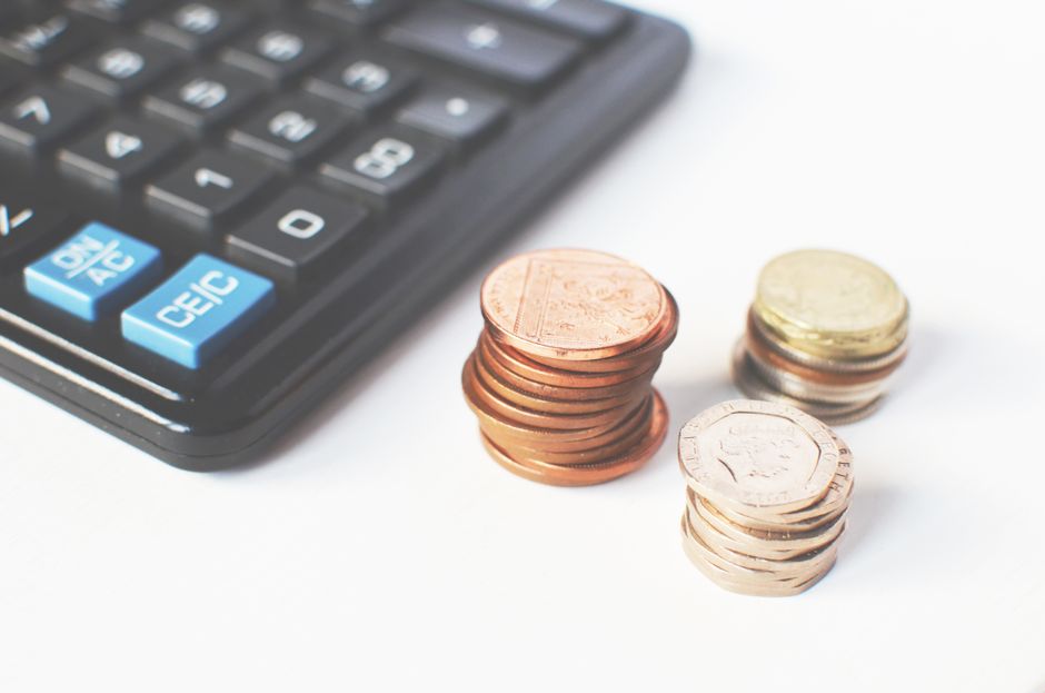 An accountant analyzing compensation adjustments and salary growth statistics