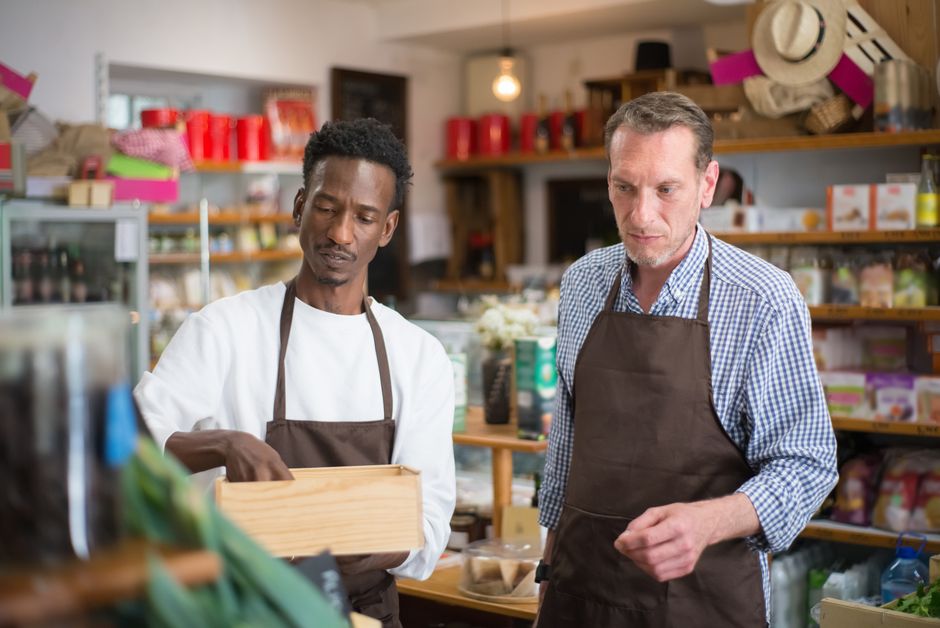 A small business owner reviewing financials in their shop