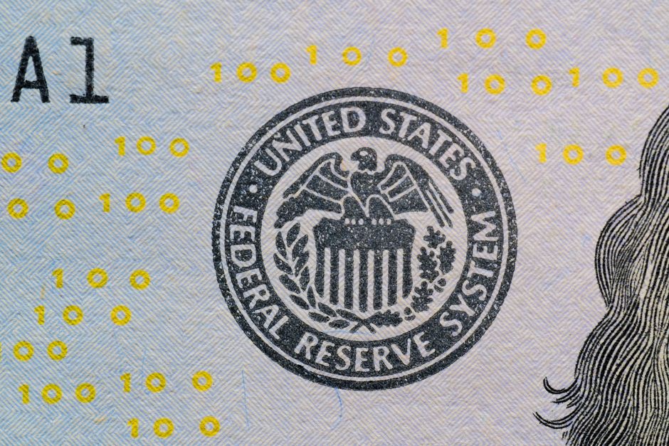 A stately financial building representing the Federal Reserve and interest rate policy.