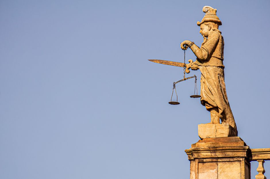 A conceptual photo showing a balance scale representing risk reward trade offs.