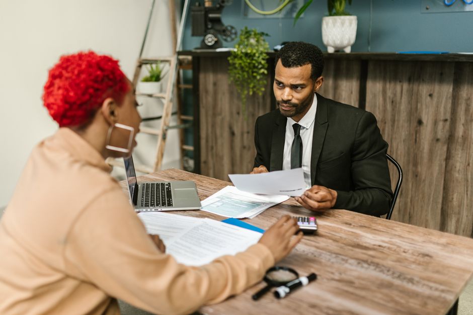 An accountant meeting with a client discussing financial strategies