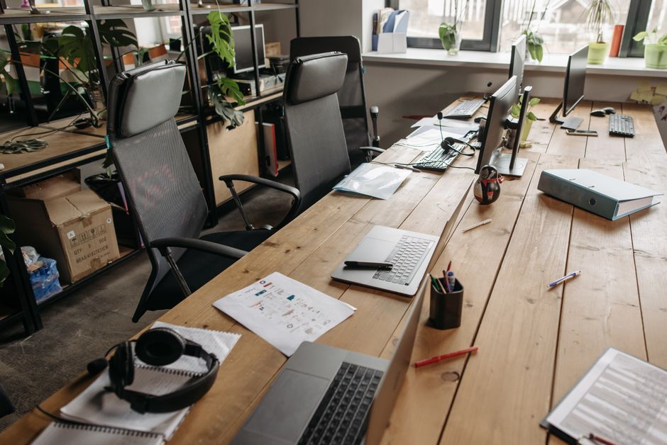 An office with vacant desks symbolizing the persistent accountant shortage
