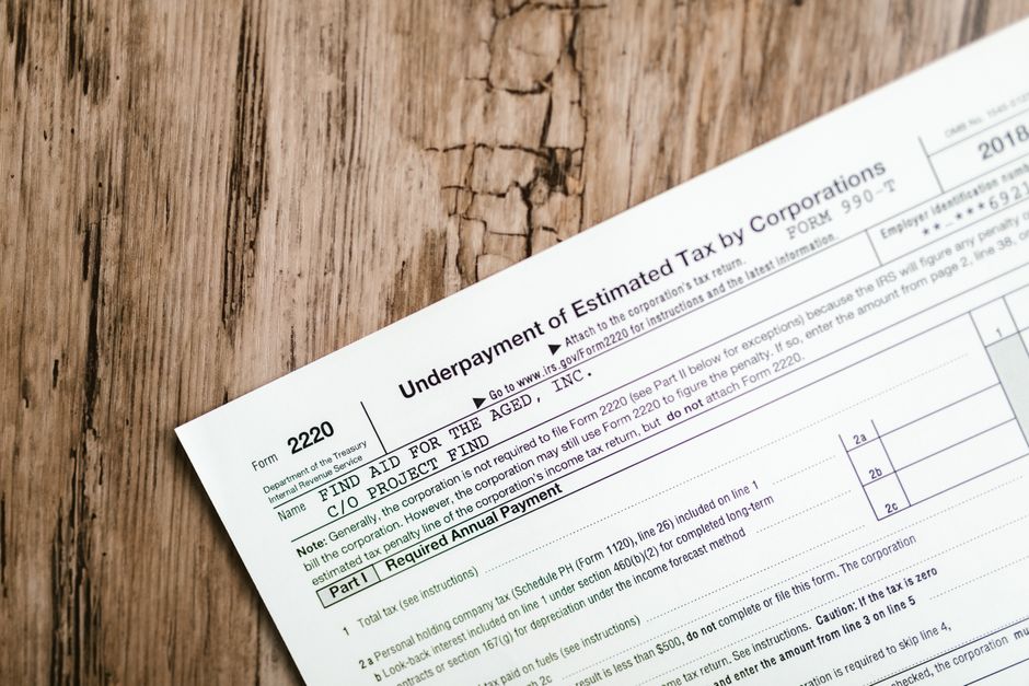 A compliance checklist on a desk representing why the accounting cycle steps matter.