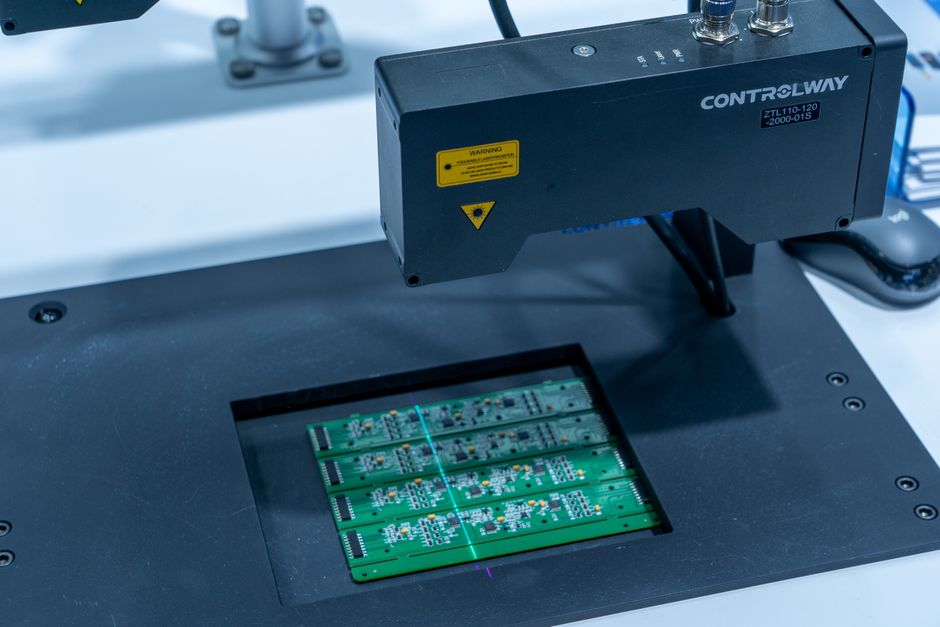 Optical character recognition scanner processing financial invoices into digital systems.