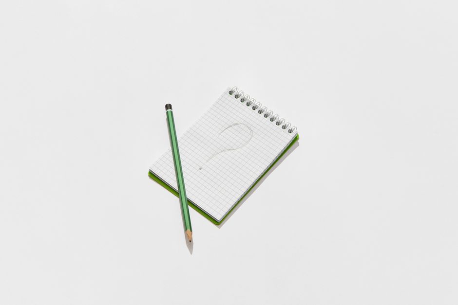 Notebook with a question mark for startup accounting questions
