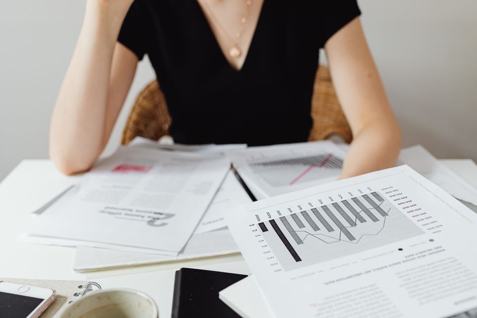 A corporate finance team conducting month-end closing procedures.