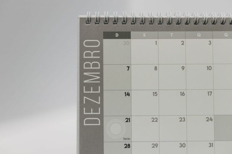 An office planner and calendar representing a month-end close schedule.