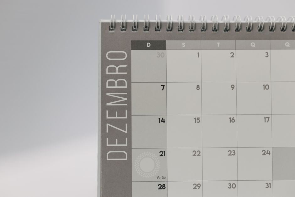 An office planner and calendar representing a month-end close schedule.