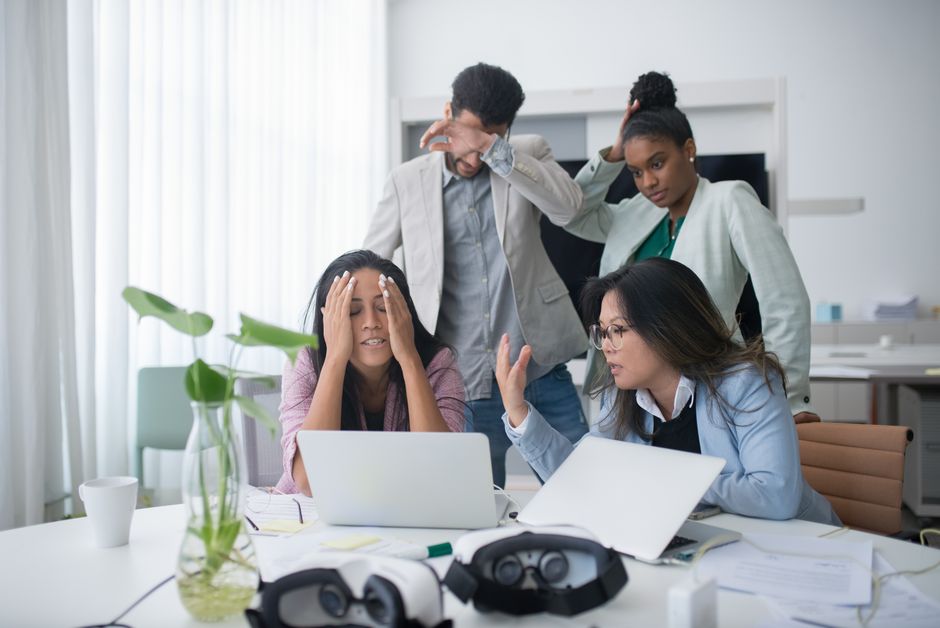 A team resolving exceptions in financial software workflows.