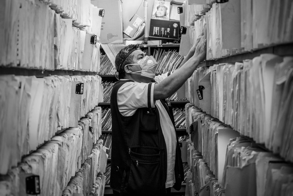 Filing cabinet with organized records representing multi-year document retention.