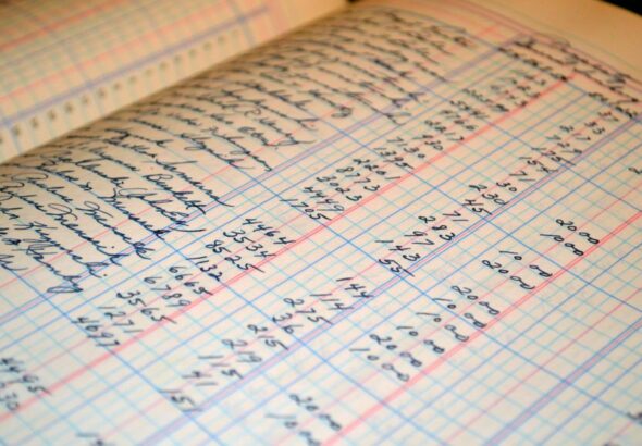 Corporate financial tax executives reviewing Adjusted Financial Statement Income under CAMT