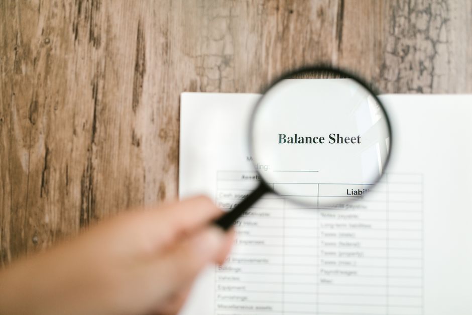 A corporate financial report and general ledger spreadsheet representing expense disaggregation under FASB ASU 2024-03